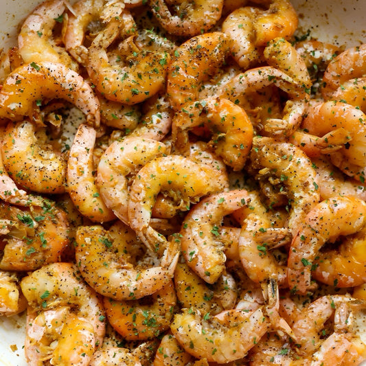 Family meals packed with shrimp dripping in butter and seasoned with seasonings straight from New Orleans