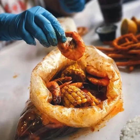 Seafood boil bag with shrimp, corn, sausage and Cajun seasoning in Los Angeles style seafood boil
