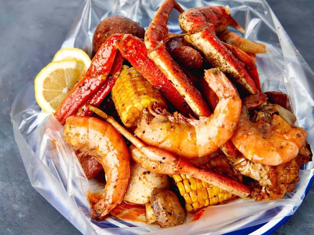 Fresh seafood boil with crab legs, shrimp, corn, sausage, and potatoes available for online takeaway and late night food delivery from Boil Baby Boil