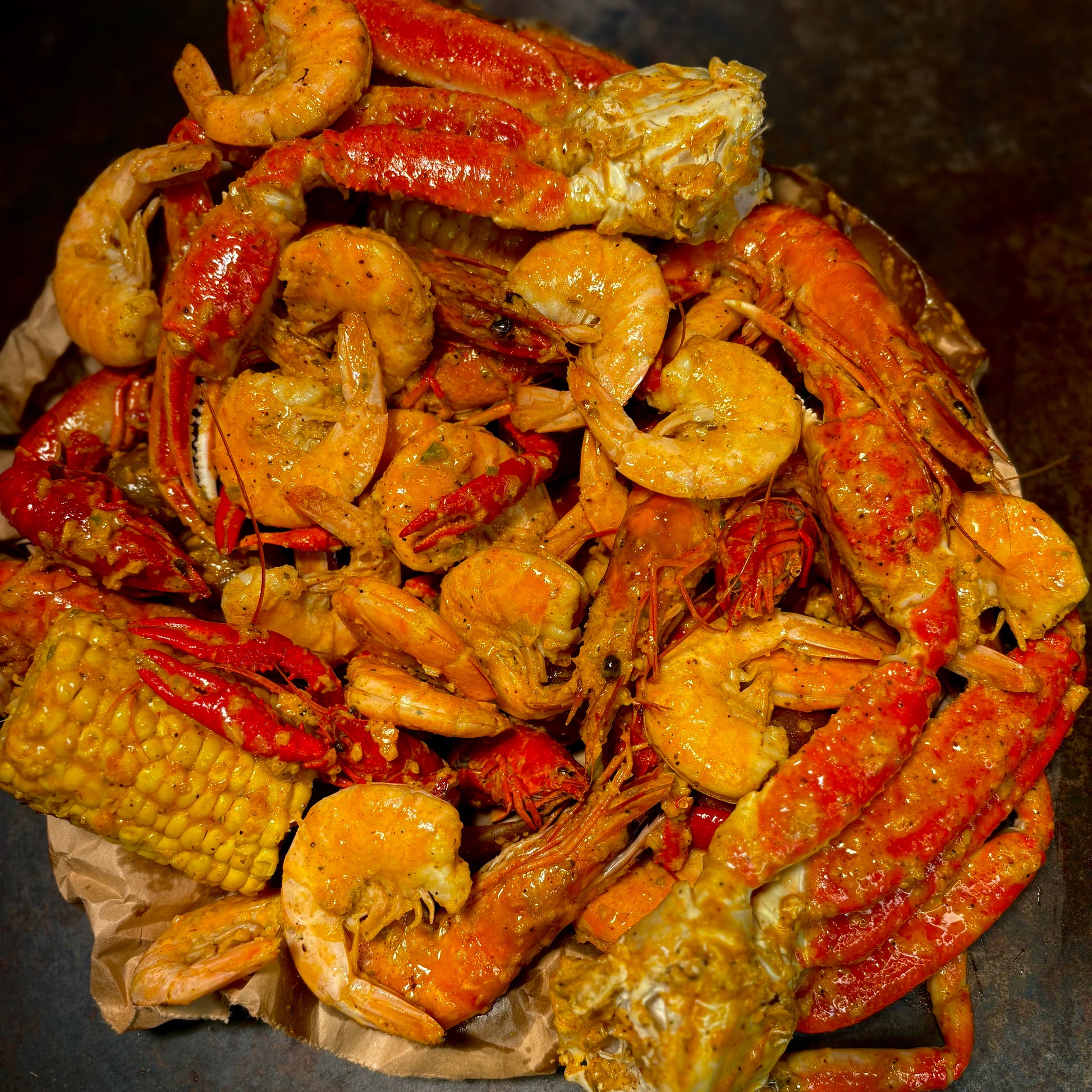 Boil Baby Boil seafood boil bag loaded with Cajun shrimp, sausage, corn, and garlic butter—late-night comfort food favorite in West Hollywood.