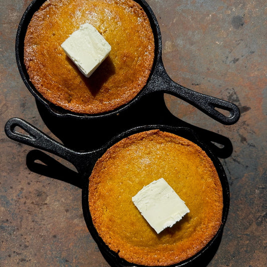 Golden honey butter cornbread baked in mini cast iron skillets, served warm with a thick pat of butter—Southern comfort at its finest in West Hollywood’s favorite Cajun seafood spot.