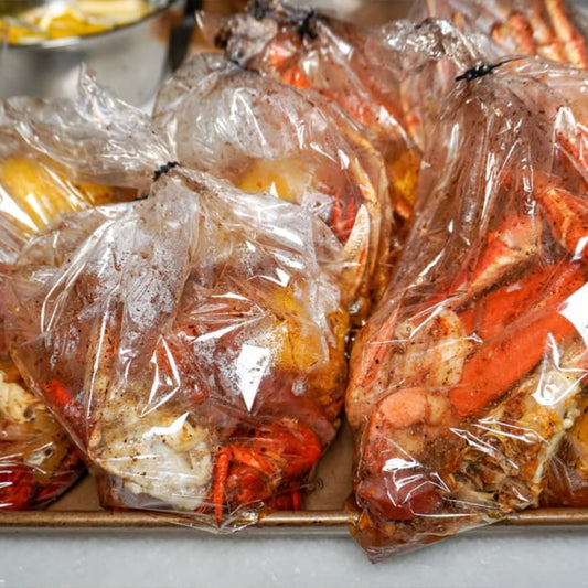 Los Angeles party trays: crab & shrimp boil bags by Boil Baby Boil.